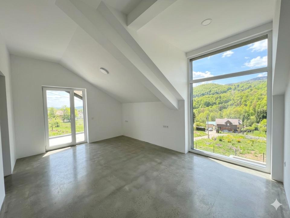 Casă arhitectură modernă cu panoramă spre Munții Făgăraș și Cetatea Cisnădioara 