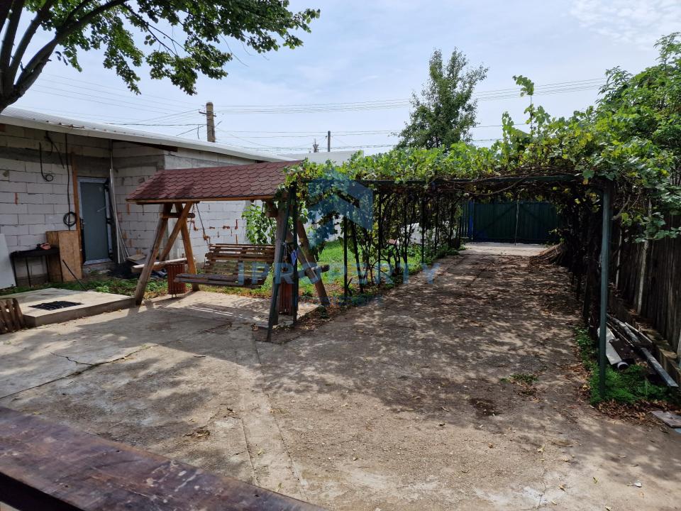 Casa individuala teren 1700 mp cu spatiu comercial la strada - fotografie proprietate 6